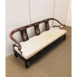 A Chinese two seater sofa with mother of pearl design. (H76cm D60cm W171cm)