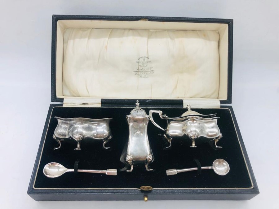 A silver cruet set, hallmarked Birmingham.