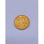 A 1907 Gold Sovereign coin.