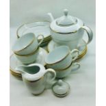 A tea service for four by Fairmount "8908 Infinity" to include, teapot, milk jug, sugar bowl (lid