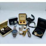 A selection of watches and cufflinks