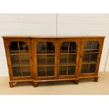 A Large Display Cabinet 90 cm High x 165 cm Long x 31 cm Deep.