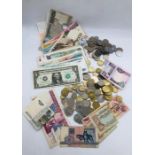A selection of loose International coins and bank notes