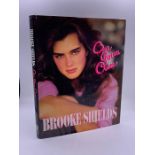 A Selection of Actress Brooke Shields signed items to include a book and two cards to double Oscar