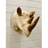 A Decorative Rhino head with gilt ears and horn (35cm x 51cm)