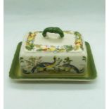A Chinese butter dish decorated with a pair of exotic birds marked Zeuam Harmersbach