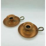 A pair of Guernsey Copper craft candle holders