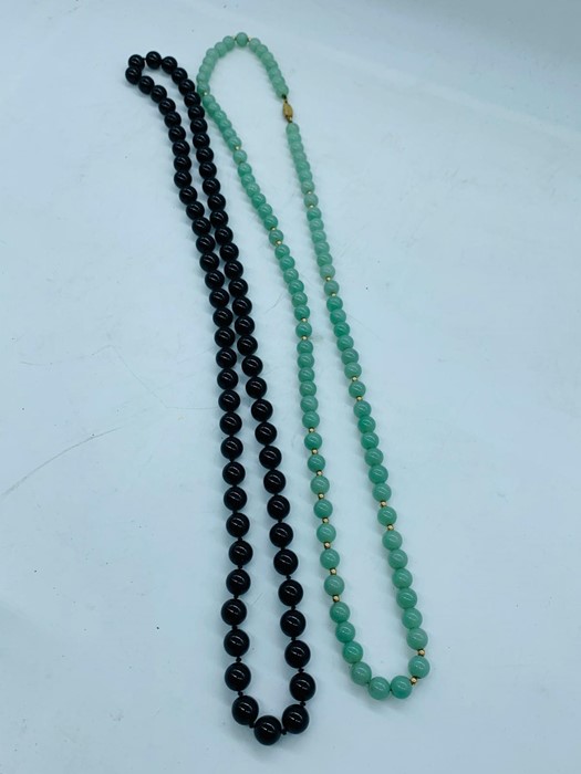 A Vintage Jade Necklace and an Onyx Necklace