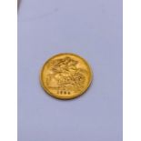 A 1929 Gold Sovereign coin.