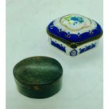 A tortoiseshell pill box and a porcelain pill box by Ruihao