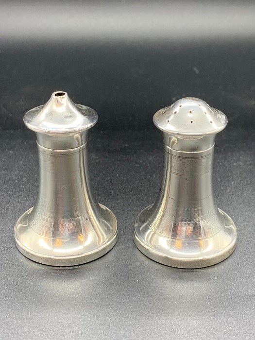 A Silver salt and pepper casters