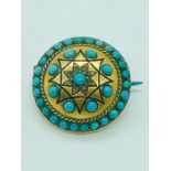 A Persian gold and turquoise brooch
