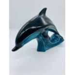 A Poole pottery dolphin