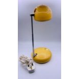 A Search light desk lamp on telescopic arm and domed hood