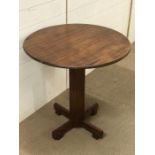 A mid century centre piece table