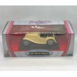 A boxed model car 1947 MG TC MIDGET, 1:18 Road Signature Collection