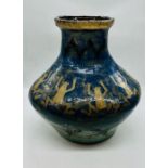 A large Studio Pottery vase, mainly blue with frog pattern signed to the base "Maura" standing