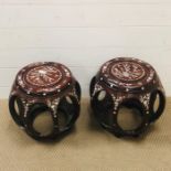 A Pair of Chinese stools with mother of pearl design.(one slightly larger than the other)