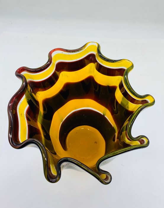 A wave rim vase of acid yellow and dark purple wave