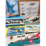 A selection of seven boxed kits to include six aircraft and an Airfix Waterline model kit