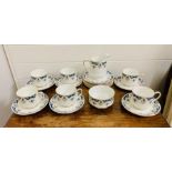 A Paragon tea set comprising six cups, saucers, sideplates, sugar boql and milk jug