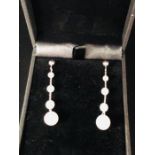 A Pair of White Gold Graduated Pearl Drop Earrings