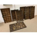 Eight printers trays and brass letters