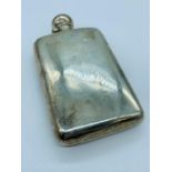 White Metal Hip flask with indistinct hallmarks.