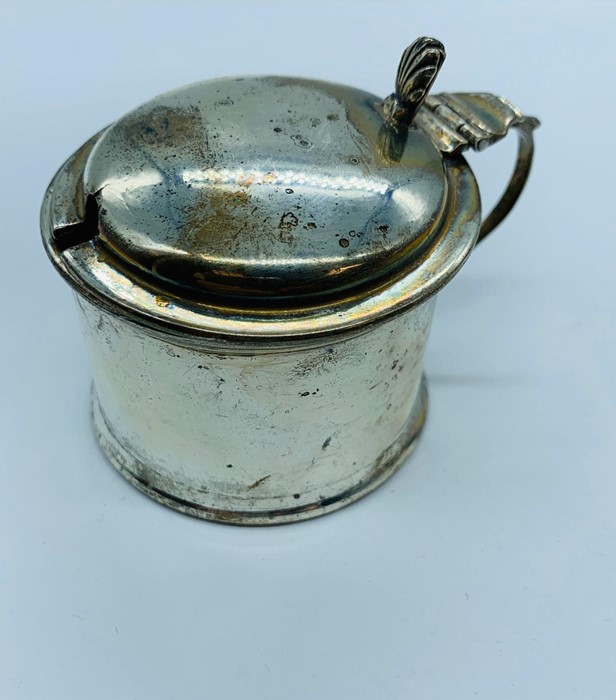 A Silver mustard pot cover, hallmarked.