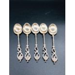 Five continental silver teaspoons
