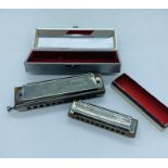 Two harmonicas both made in Germany by M. Hohner