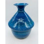 A glazed blue studio pottery vase