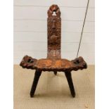 A carved wooden stool with leather seat (H78cm W46cm)