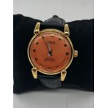 A Vintage Oris 17 Jewels Shock Proof Orange Faced Watch