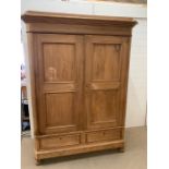 A double pine cupboard with two drawers under, on bun feet with shelves AF (H200cm W133cm D61cm)