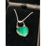 A Silver and Malachite Heart Shaped Pendant necklace on silver chain