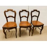 Three mahogany balloon back chairs