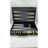 A backgammon set in a carry case