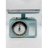 Tower vintage kitchen scales with glass finger loop bottle printed with the words Fruit Juice