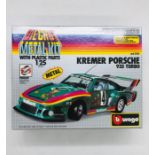 A boxed Diecast metal kit of a Kremer Porsche 935 turbo