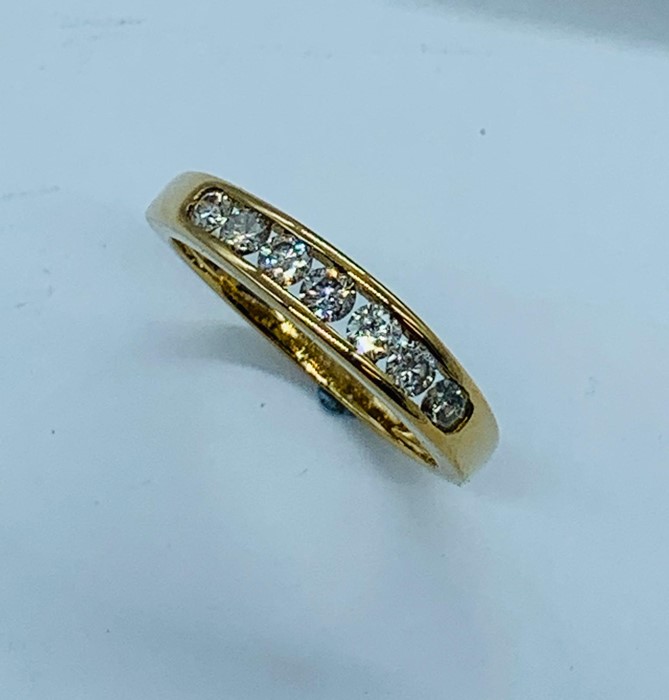 A 9ct gold eternity style diamond ring. Size N - Image 2 of 4