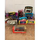 A selection of Various boxed model vehicles to include Dinky, Vitesse, Solido, Russo Balt, and