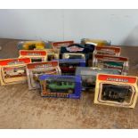 A selection of fourteen boxed models cars to include Days Gone, Corgi, Metal Collection Armour and