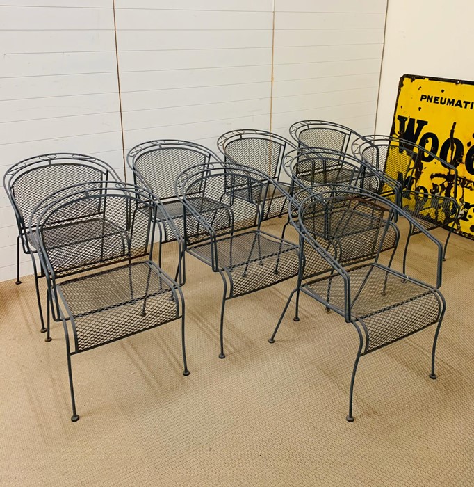 Nine garden metal stacking chairs (H75cm W58cm)