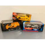 Three die cast boxed vehicles