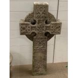 A Celtic style stone ornament of a cross (100cm x 48cm)