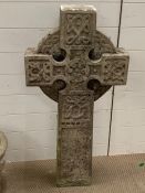 A Celtic style stone ornament of a cross (100cm x 48cm)