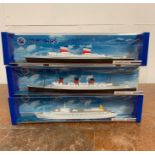 Three boxed Minic Ships to include RMS Queen Mary, RMS Canberra and SS United States