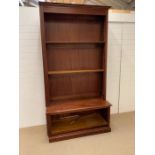 A library bookcase (H240cm W124cm D56cm)