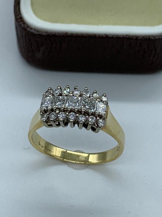 An 18ct yellow gold diamond set cluster ring. Consisting of wide flat section shank in yellow - Image 3 of 3